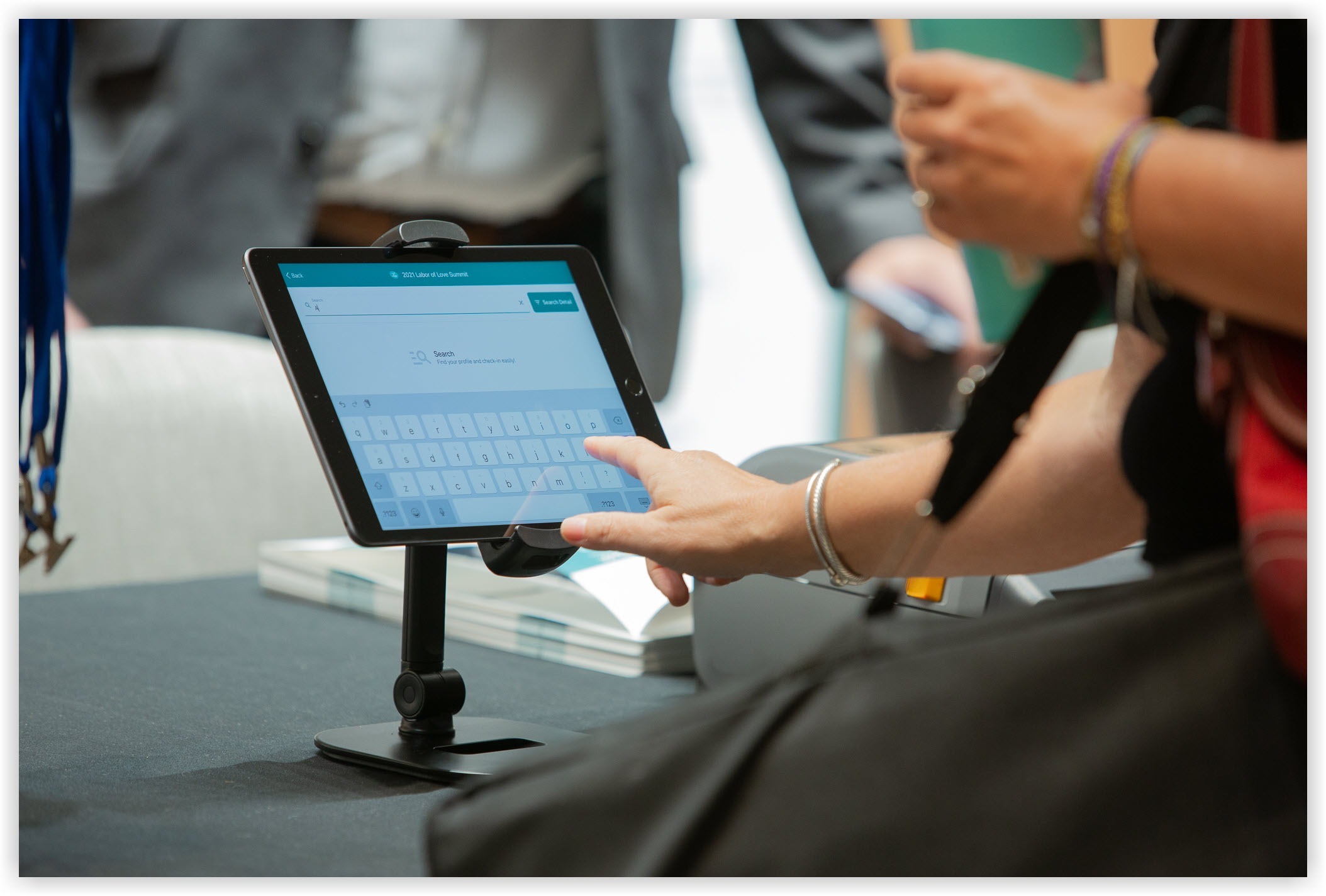 A person using the Onsite app to check in to an event.