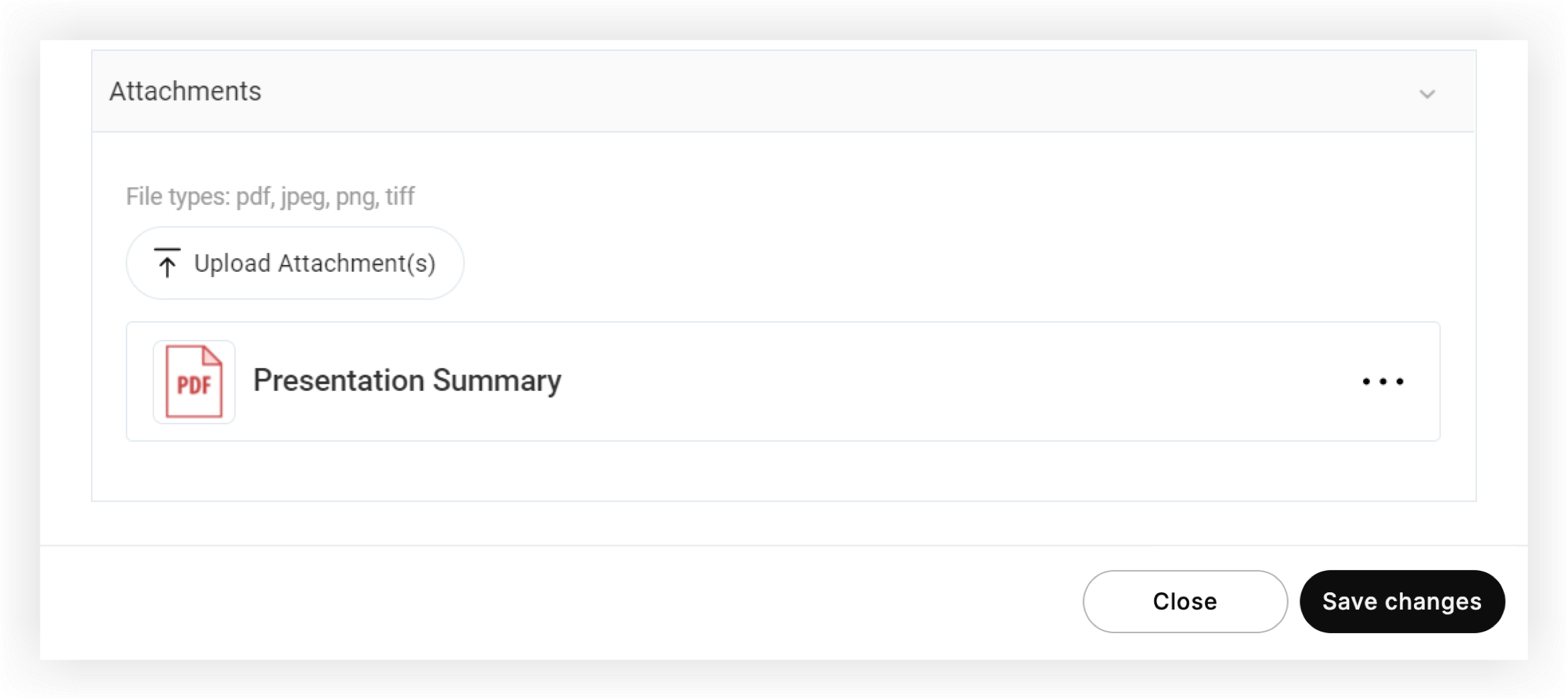 A PDF attached in the Attachments section of the modal.